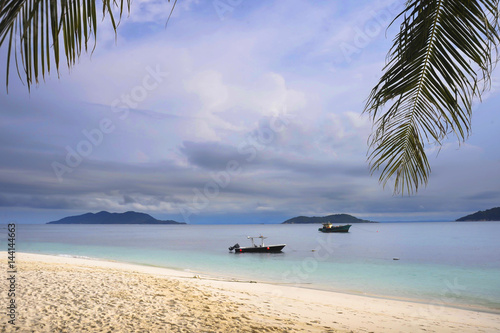 paradise sea landscape with white sand and emerald ocean shore in Rawa Island Malaysia