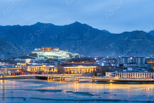 beautiful lhasa in nightfall photo