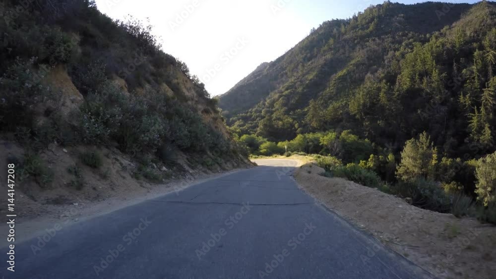 San Gabriel mountains road driving near Switzer Falls in the Angeles National Forest area of Southern California. San Gabriel mountains road driving near Switzer Falls in the Angeles National Forest area of Southern California.