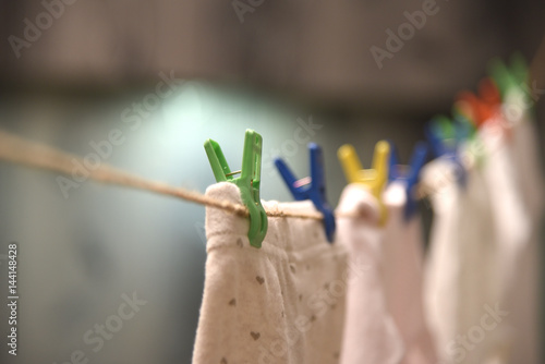 Baby linen on cord clothespin