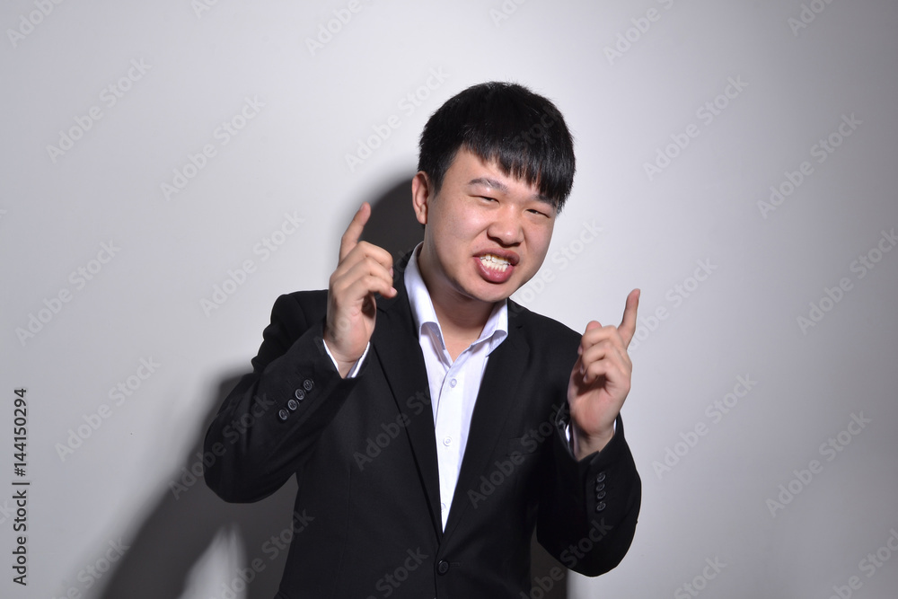 Young Asian business man portrait on white background. Young Asian business man portrait on white background.