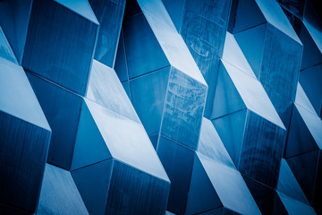 detail shot of modern architecture facade,business concepts in blue tone,shot in city of China.
