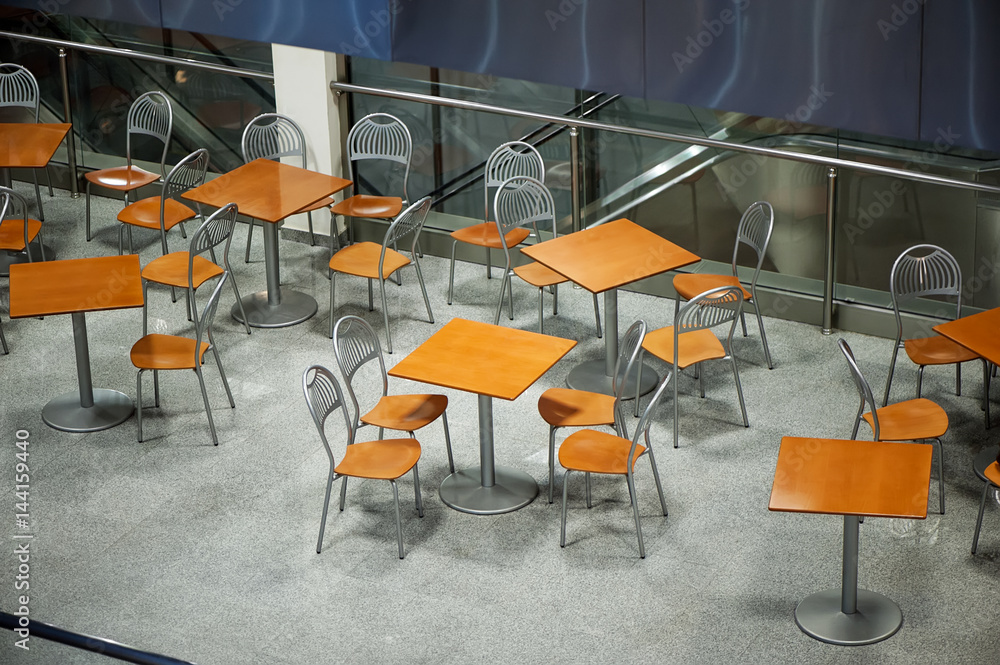 food court interior with tables and chairs view from above
