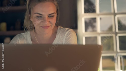 Beautiful blonde using laptop