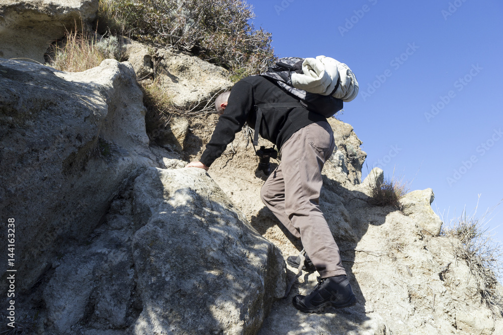 hiker climbs on mountain in gulf of naples hiker climbs on mountain in gulf of naples