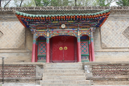 Amdo Tibet Tibetan Monastery Door Gate Red Decorated Decorative Carved Carving Wood Buddhist Buddhism Buddha Holy Temple Shrine Beautiful Offering Offer China Qinghai Huangzhong Kumbum Taersi Taer 