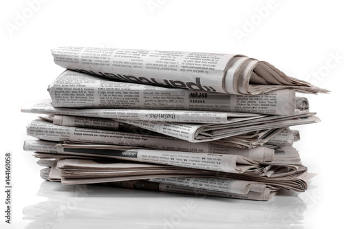 newspaper stack isolated on white background