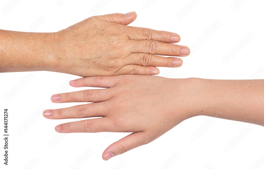 Teenage hand and elderly hand isolate on white Teenage hand and elderly hand isolate on white