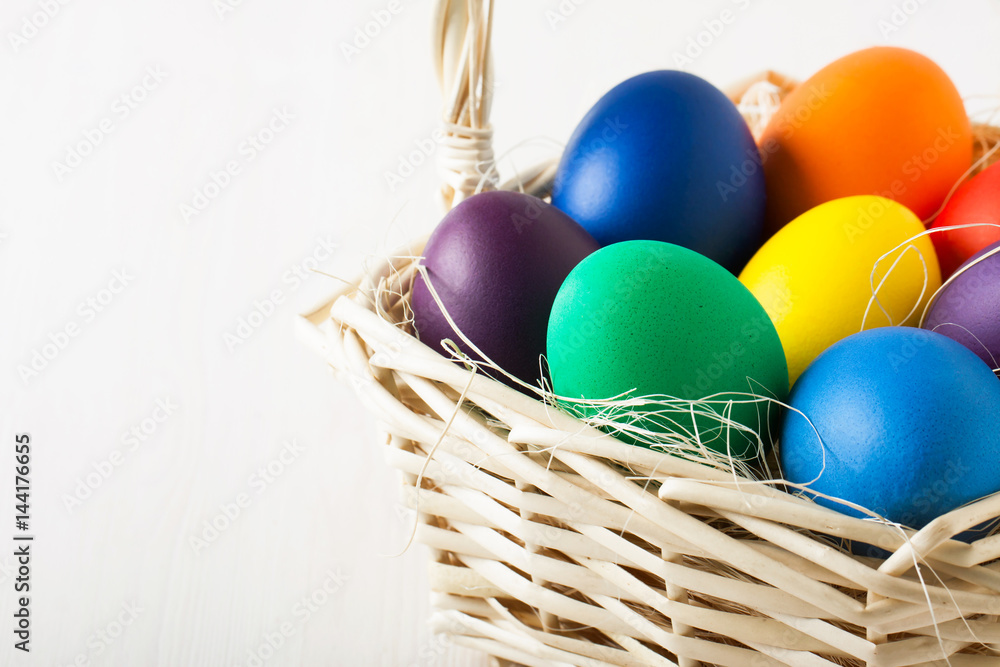 Colored Easter eggs in a basket