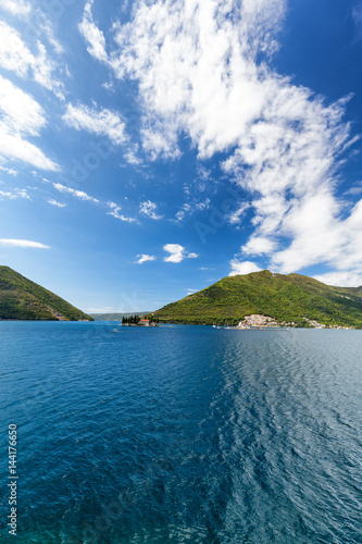 Portrait view of the Our Lady of the Rock and the Sveti Dordje churches on neighboring islands in the Bay of Kotor, Montenegro. photo