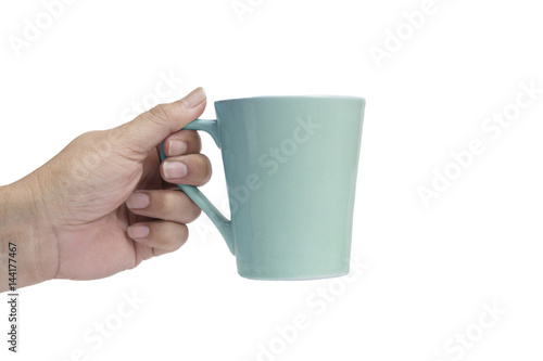 Hand holding cup of coffee.