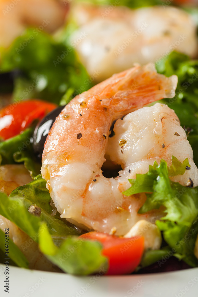 Shrimp salad with tomato, olives and cashew nuts. Shrimp salad with tomato, olives and cashew nuts.