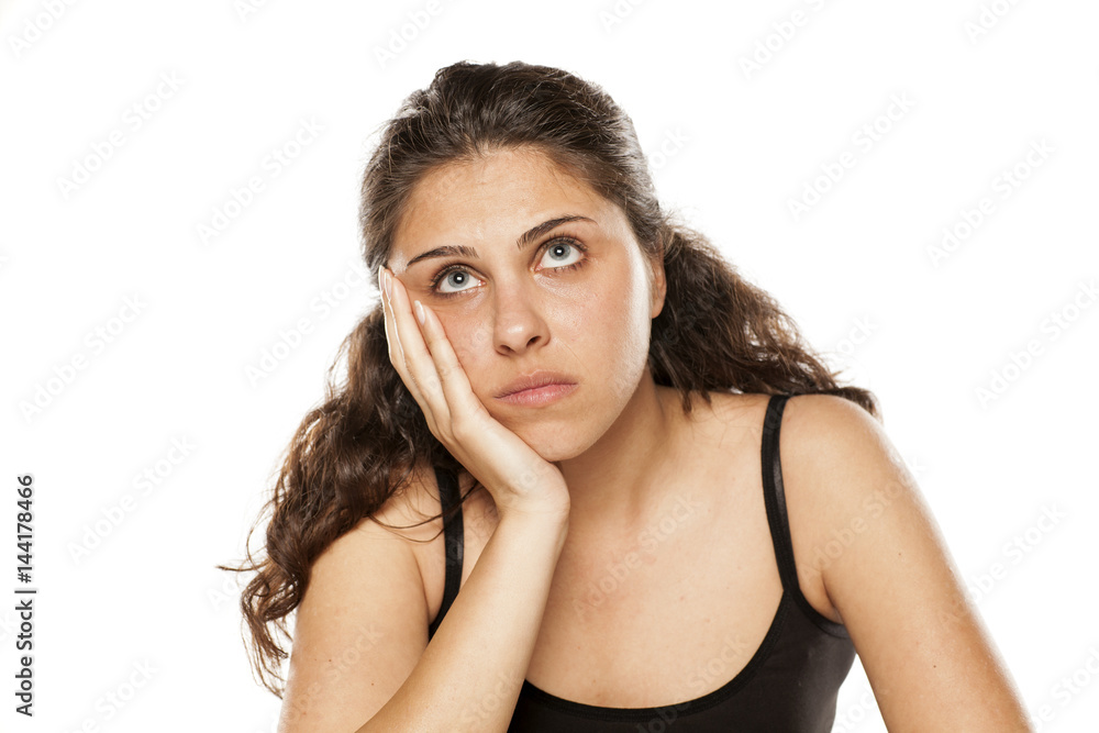 beautiful young brunette is bored and tired beautiful young brunette is bored and tired