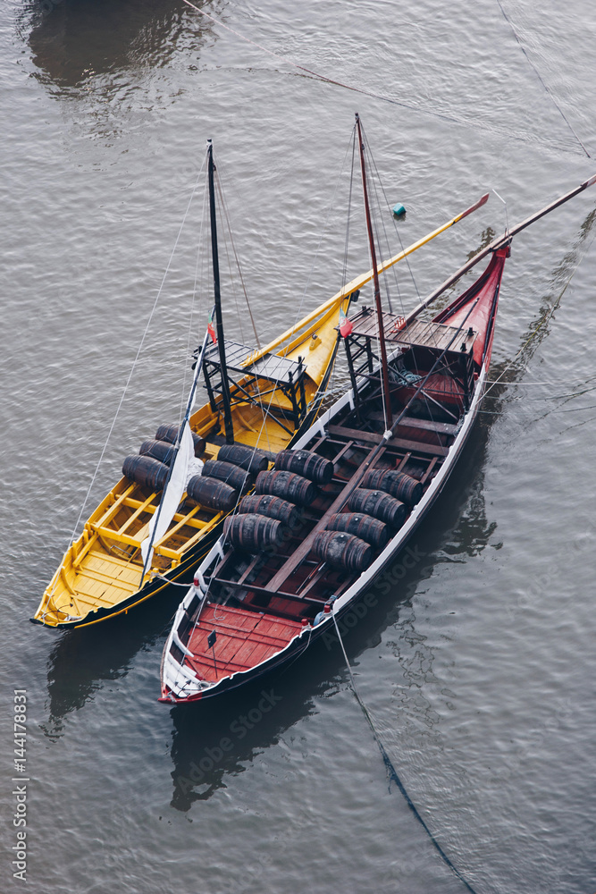 Top view of yellow and red boats transporting Porto wine, Portugal