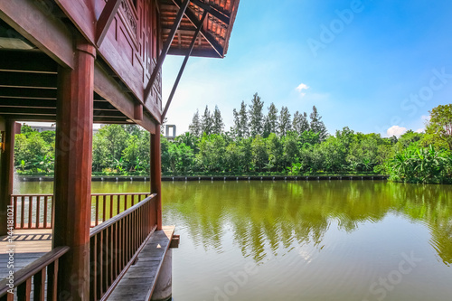 Partial of Old style  thai house on the river with blue sky