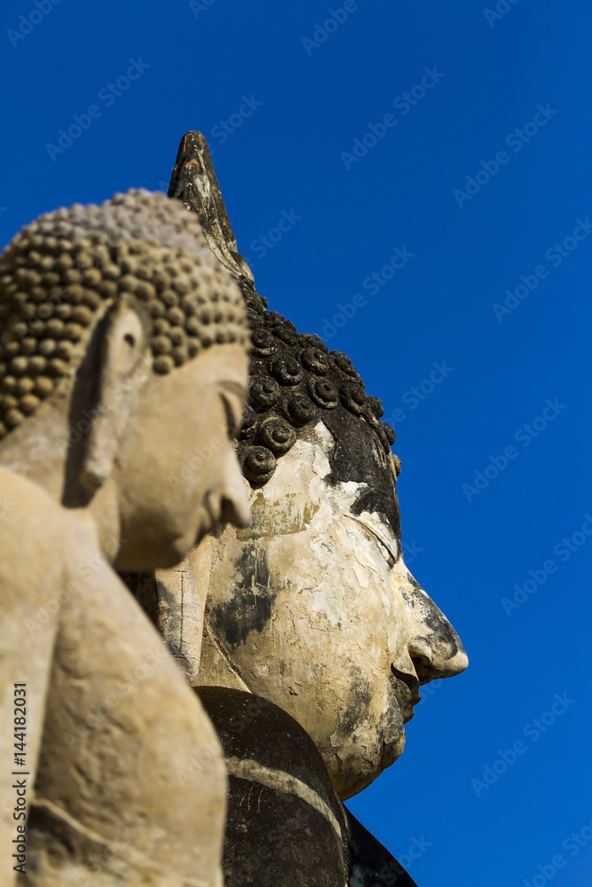 Fototapeta premium Face statue buddha and blue sky