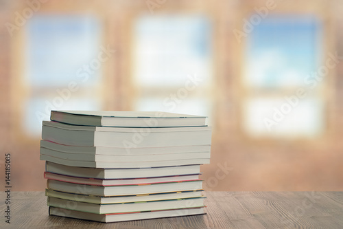 books on wooden table