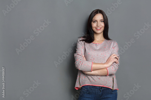 Woman with happy facial expression, studio shot