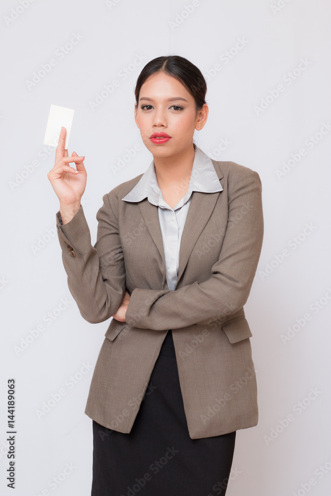 Beautiful smiling businesswoman with business card.