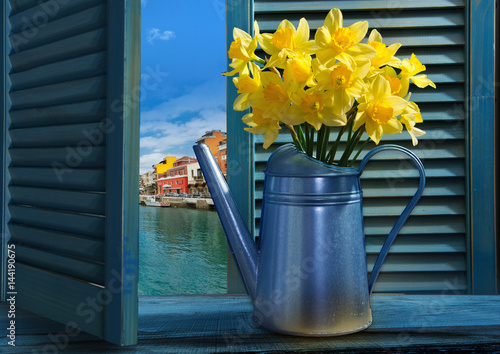 Fototapeta Naklejka Na Ścianę i Meble -   Watering can with daffodils