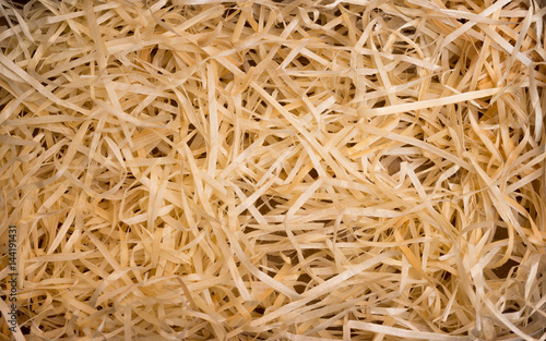 Wood background. Closeup of wooden shavings for packing.