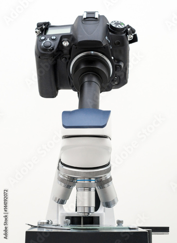DSLR Camera attached with adapter to microscope.