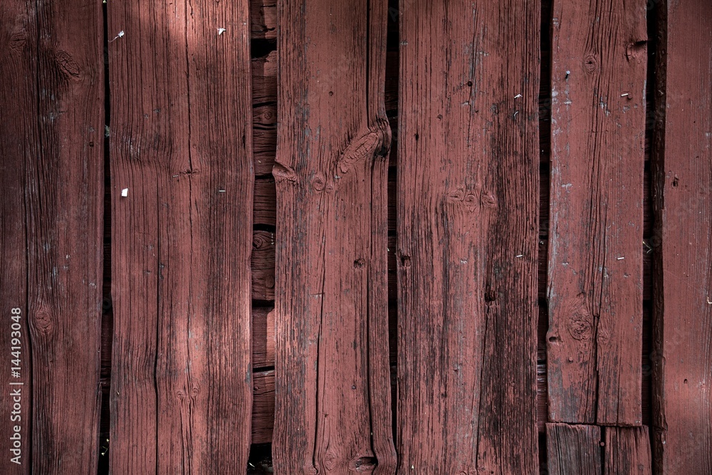 Fototapeta premium red wood paint plank closeup texture