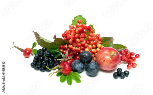 Ripe berries and fruits on a white background