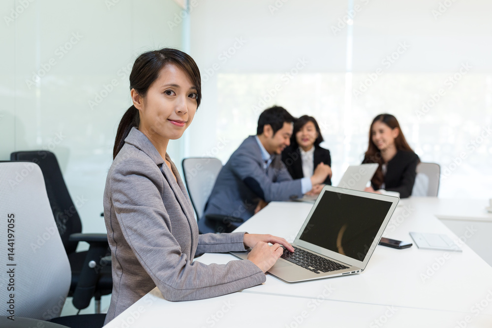 Business assistant in meeting