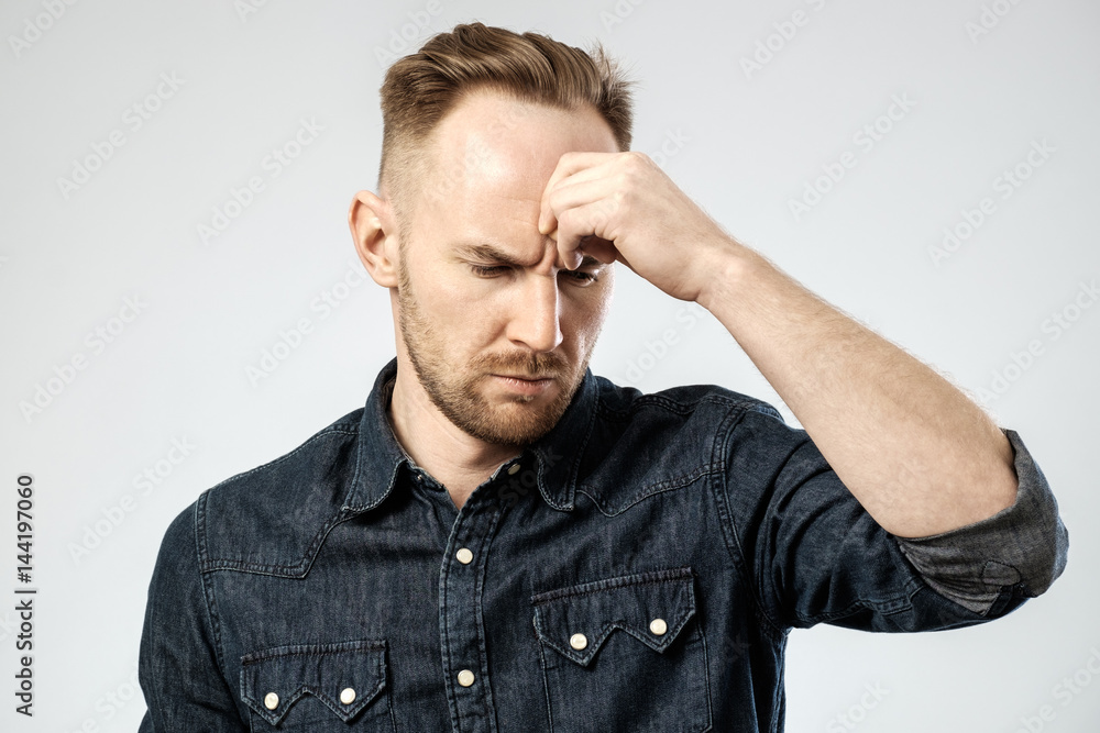 Portrait of upset young man isolated Portrait of upset young man isolated