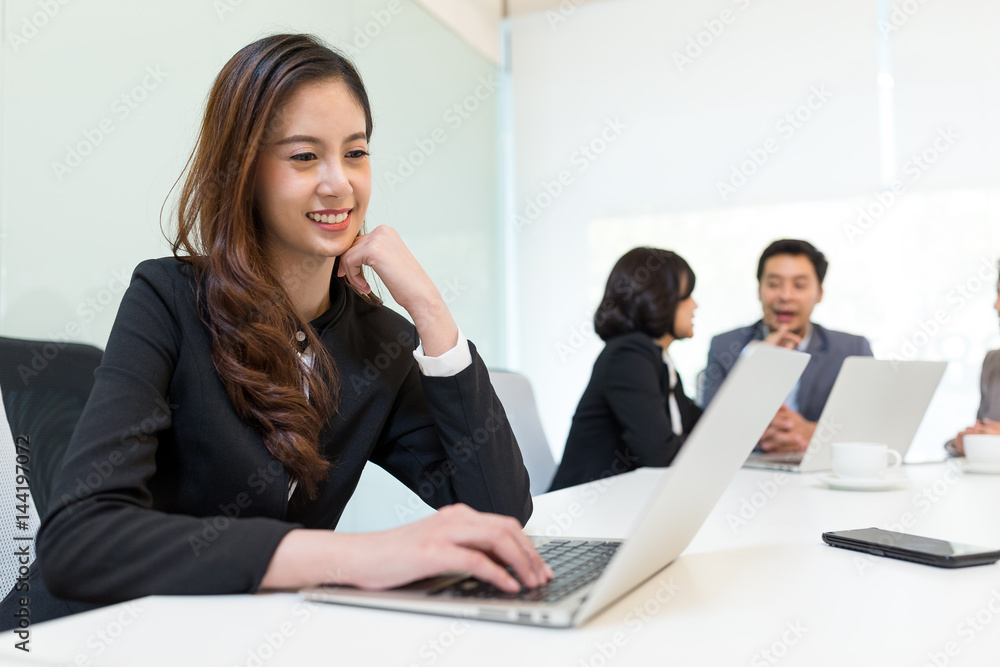 Business woman using laptop computer Business woman using laptop computer