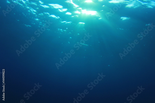 Underwater blue ocean background with sunlight  © Richard Carey