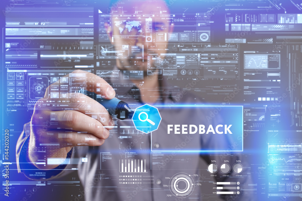 Business, Technology, Internet and network concept. Young businessman working on a virtual screen of the future and sees the inscription: Feedback Business, Technology, Internet and network concept. Young businessman working on a virtual screen of the future and sees the inscription: Feedback