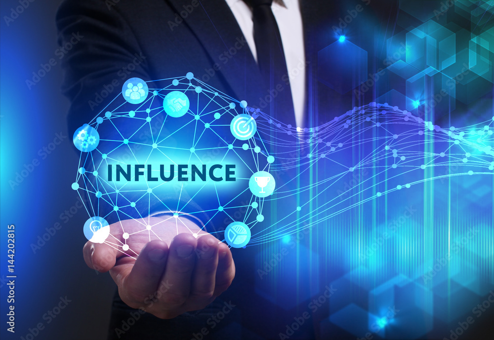 Business, Technology, Internet and network concept. Young businessman working on a virtual screen of the future and sees the inscription: Influence