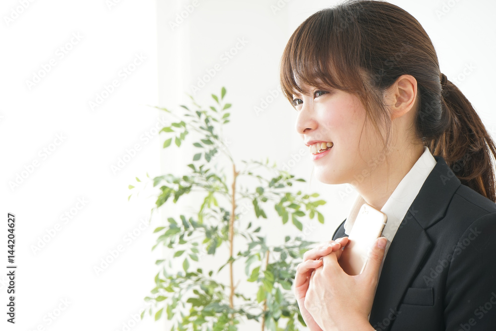 Young business woman talking on the phone