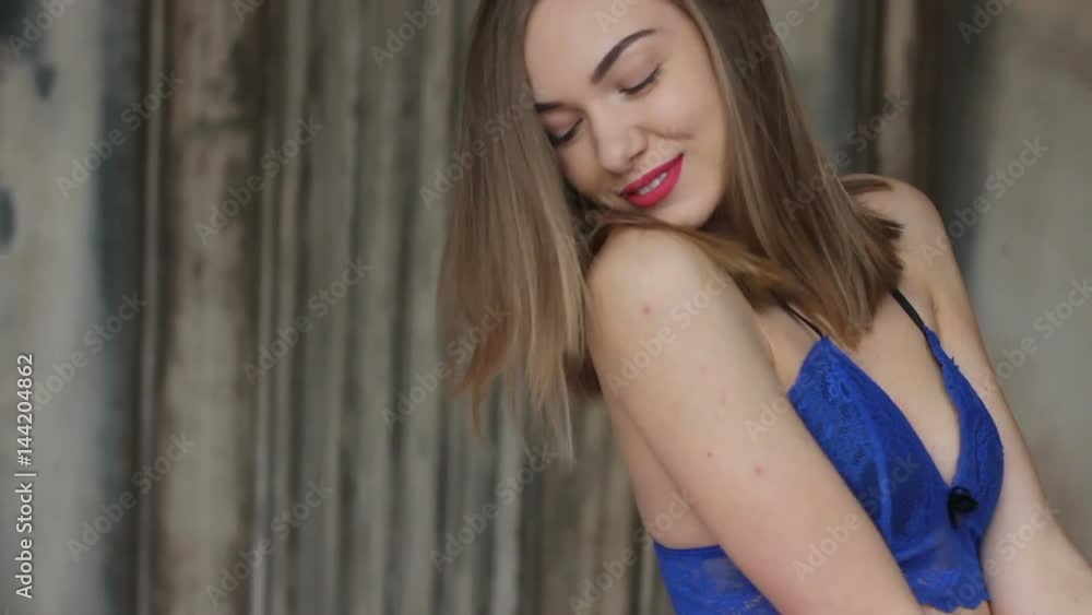 Smiling young pretty model in bed Smiling young pretty model in bed