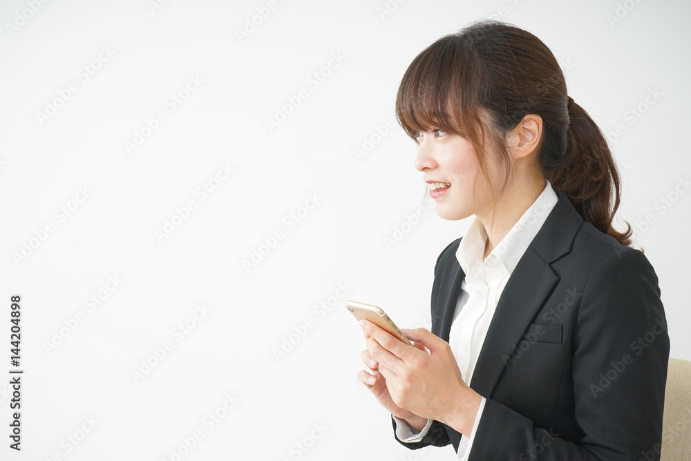 Young business woman talking on the phone Young business woman talking on the phone