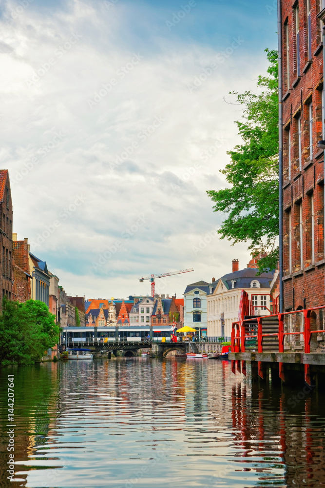 Fototapeta premium Bridge in Graslei and Korenlei over Lys River Canal Ghent