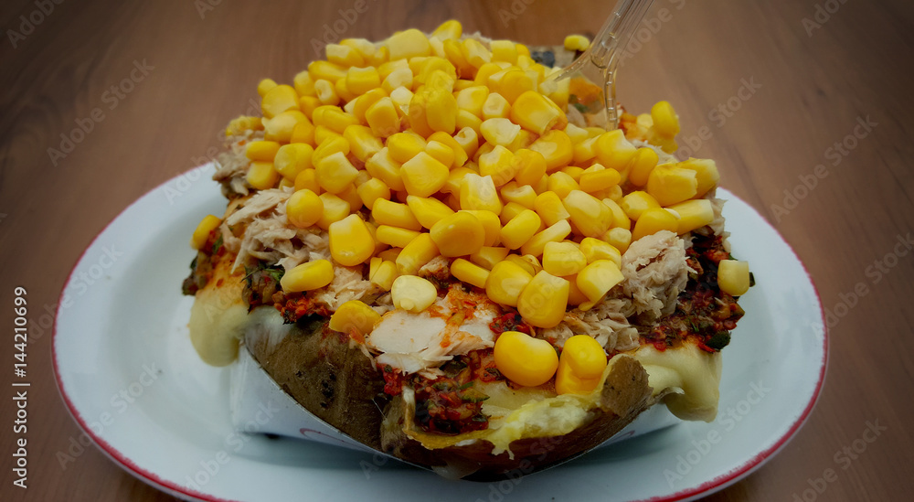 Kumpir- traditional Turkish baked potato Kumpir- traditional Turkish baked potato
