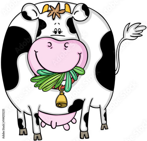 Cute cow eating grass