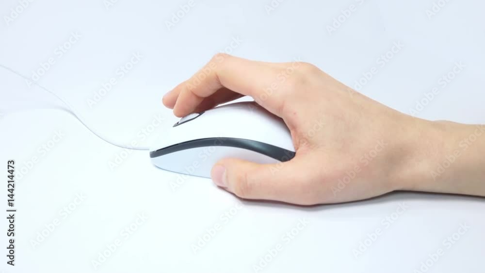 Female Hand Using a Computer Mouse on white background Female Hand Using a Computer Mouse on white background