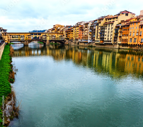 Florence on the banks of Arno with the Ponte Vecchio (Old Bridge) in the background, Italy