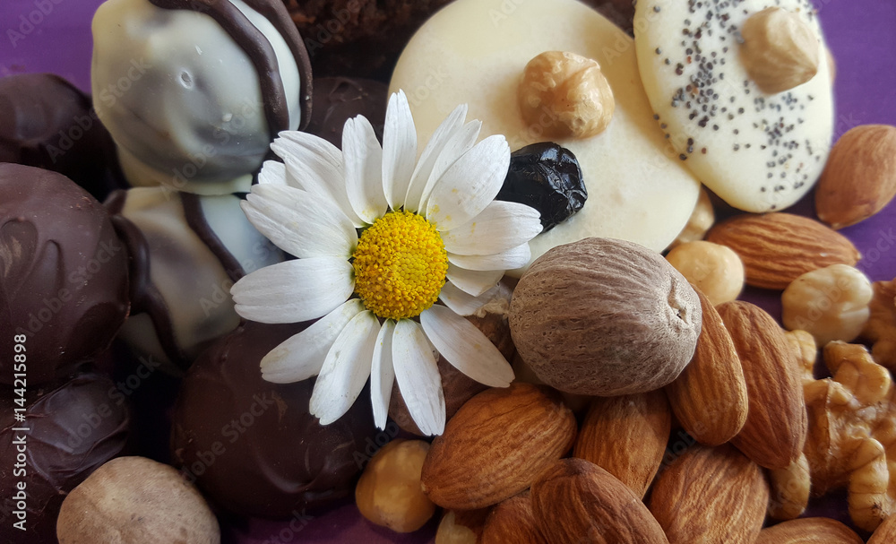 almonds, nuts and chocolate almonds, nuts and chocolate