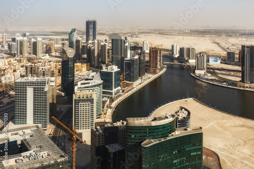 Architecture of a big modern city. Skyscrapers of downtown Dubai, United Arab Emirates. Scenic daytime skyline. Travel and architecture background.
