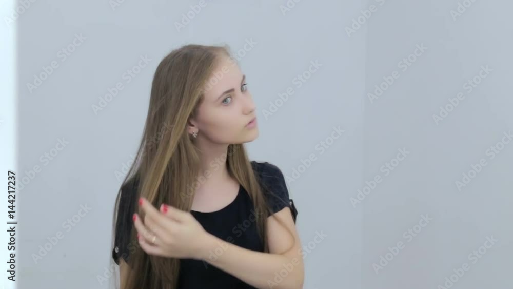 Pretty, young and sensual teen girl with long hair without make-up. Natural beauty concept Pretty, young and sensual teen girl with long hair without make-up. Natural beauty concept