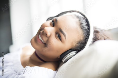 teen african young woman relaxing at home