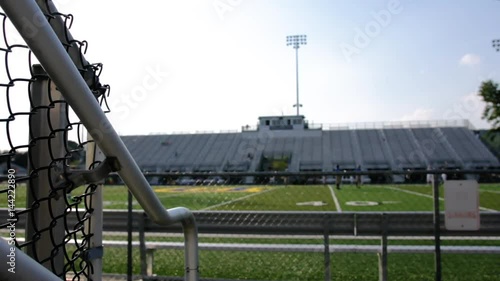 Empty high school football stadium view from the bleachers