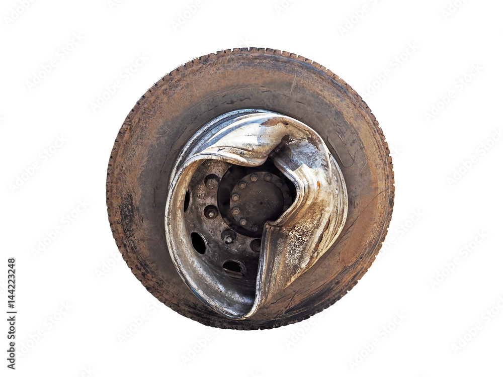 Dirty and broken tire truck wheel after the accident, damaged rim of the wheel of the truck, isolated on white background Dirty and broken tire truck wheel after the accident, damaged rim of the wheel of the truck, isolated on white background