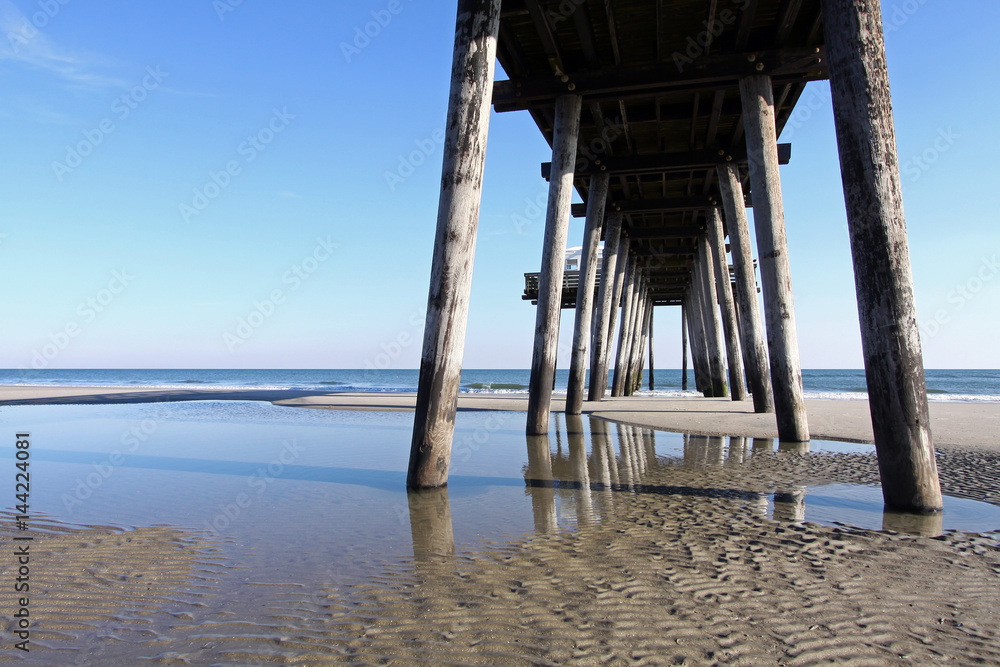 Fishing pier on the beach.