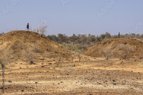 Dry river bed and view of the landscape near Niger River, Niger, Africa photo